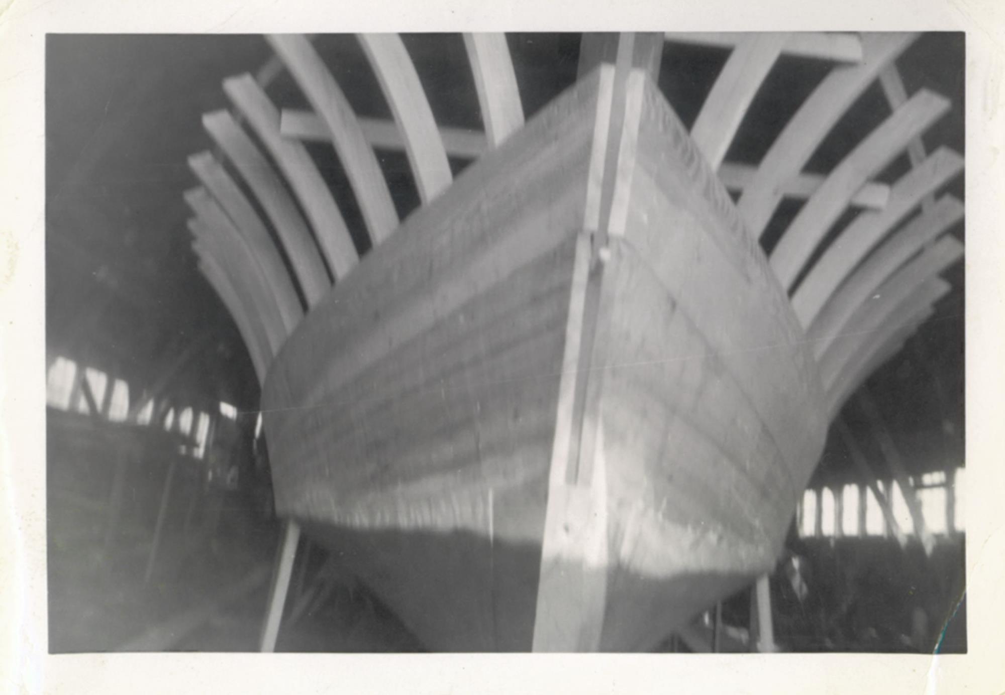 Plank-on-frame hull under construction in Bronza's boat shop. Undated.