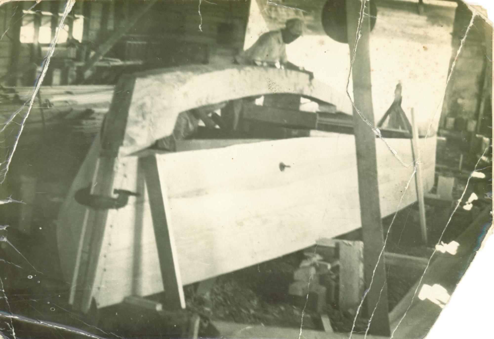 Deadrise workboats ready for bottom planking in the boat shed. Undated.