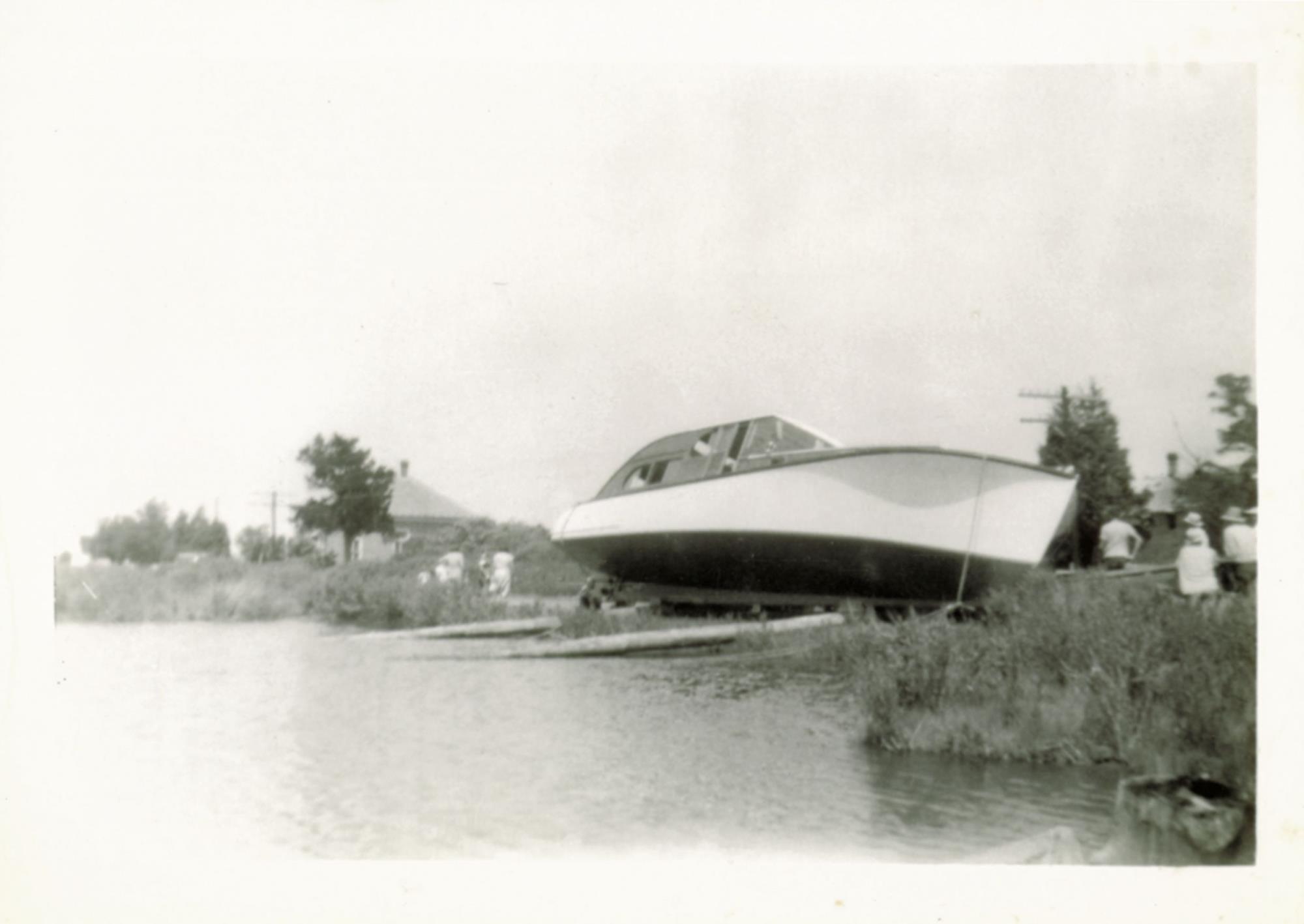 Skids in place, ready to launch into the ditch. Same yacht as above. 15 October 1955.