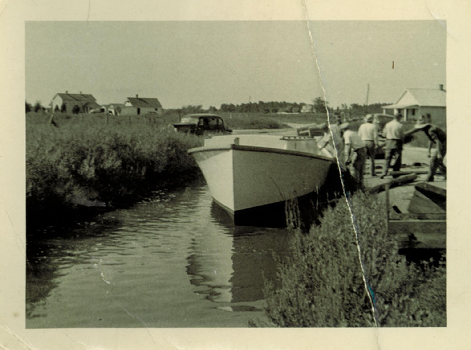 Deadrise workboat launched into the ditch near Bronza's boatyard. Undated.