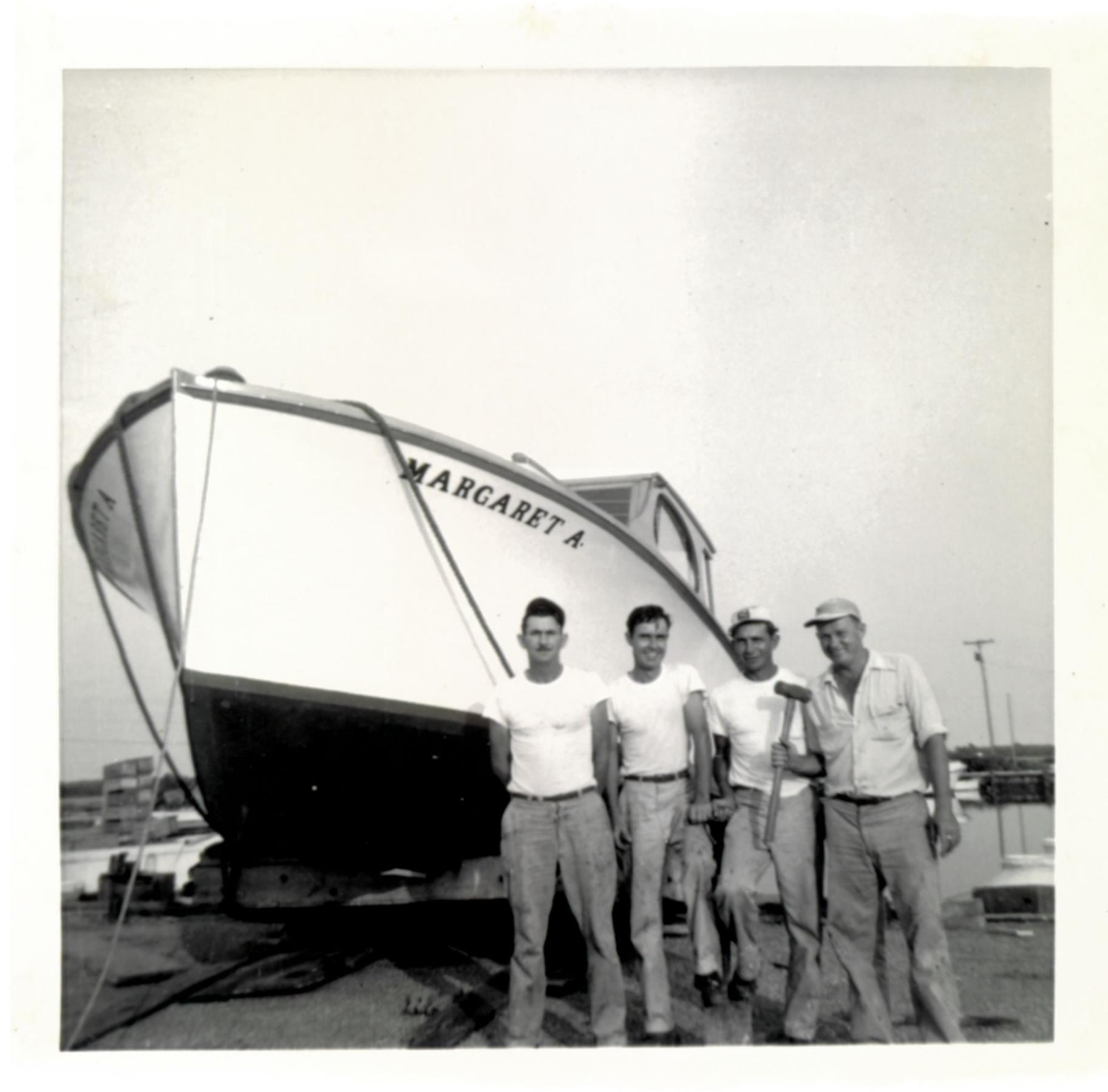Bronza's crew launching the power cruiser Margaret A . Undated.