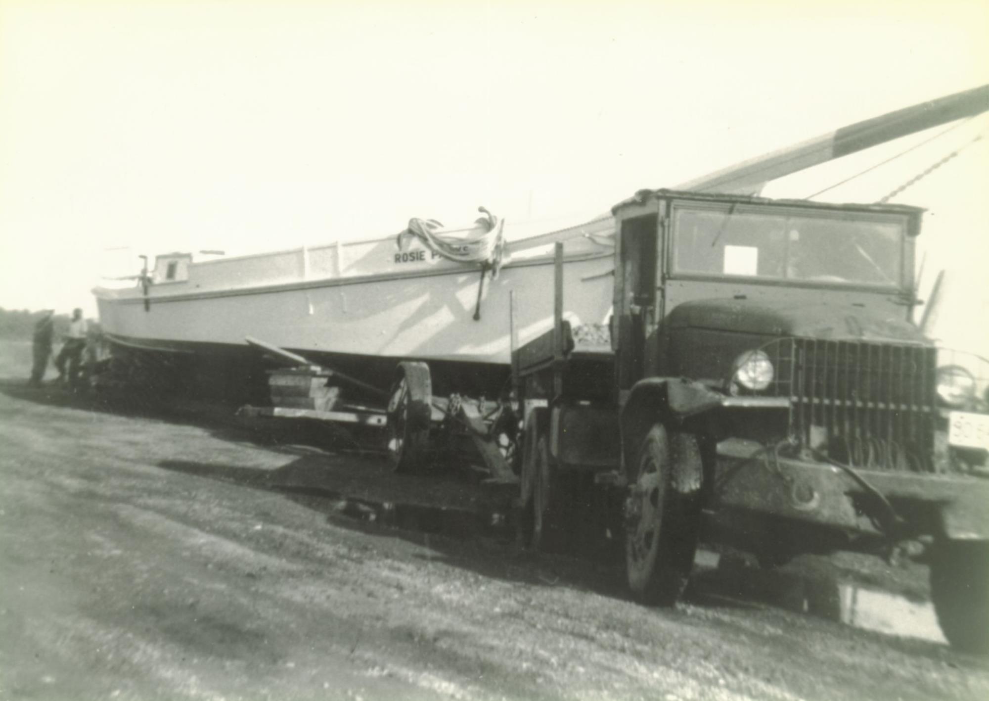 Bronza's army surplus truck hauling Rosie Parks to the water. 26 October 1955.