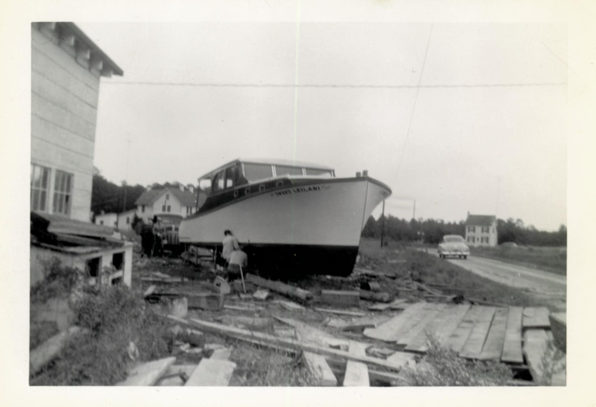 Power cruisers under construction in Bronza's boatyard. Undated.