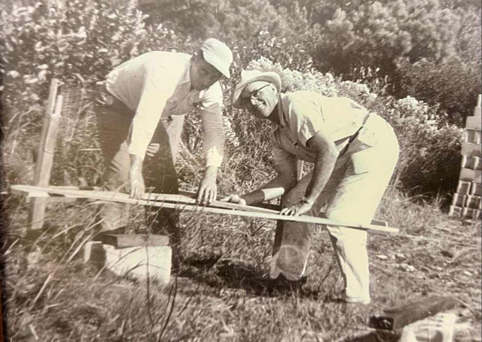 Bronza Parks and Clarence Jones lay the southeast cornerstone of the new firehouse on land that Bronza donated. Photo on display at the Lakes & Straits Fire Hall, Wingate, MD.