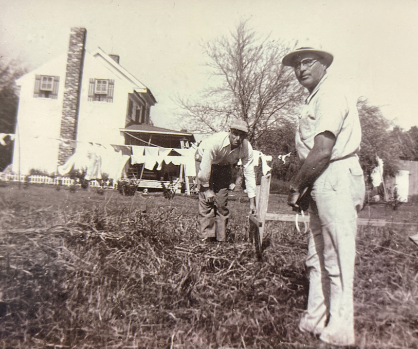 Bronza Parks and Clarence Jones lay cornerstones of the new firehouse on land that Bronza donated. View faces northeast. Boatyard is to the right. Photo on display at the Lakes & Straits Fire Hall, Wingate, MD.